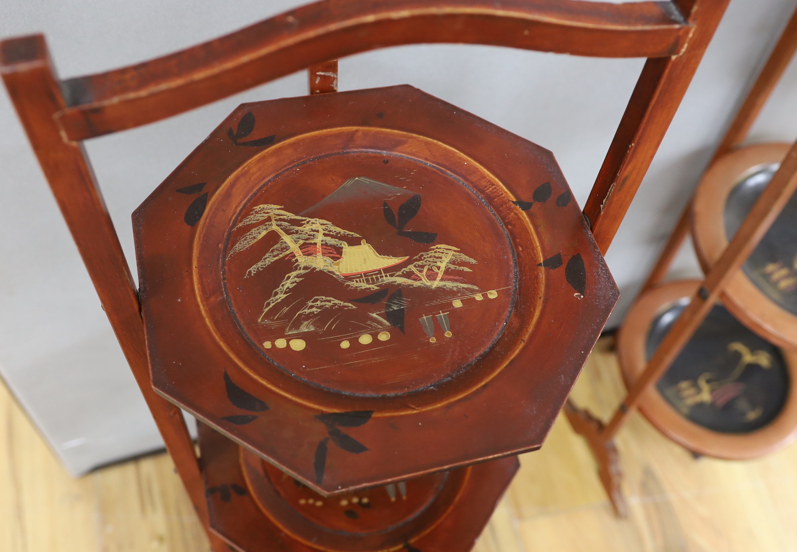 Two chinoiserie lacquer cake stands, a large lacquer tray, a quantity of boxes, blotters, an ink stand, tins etc